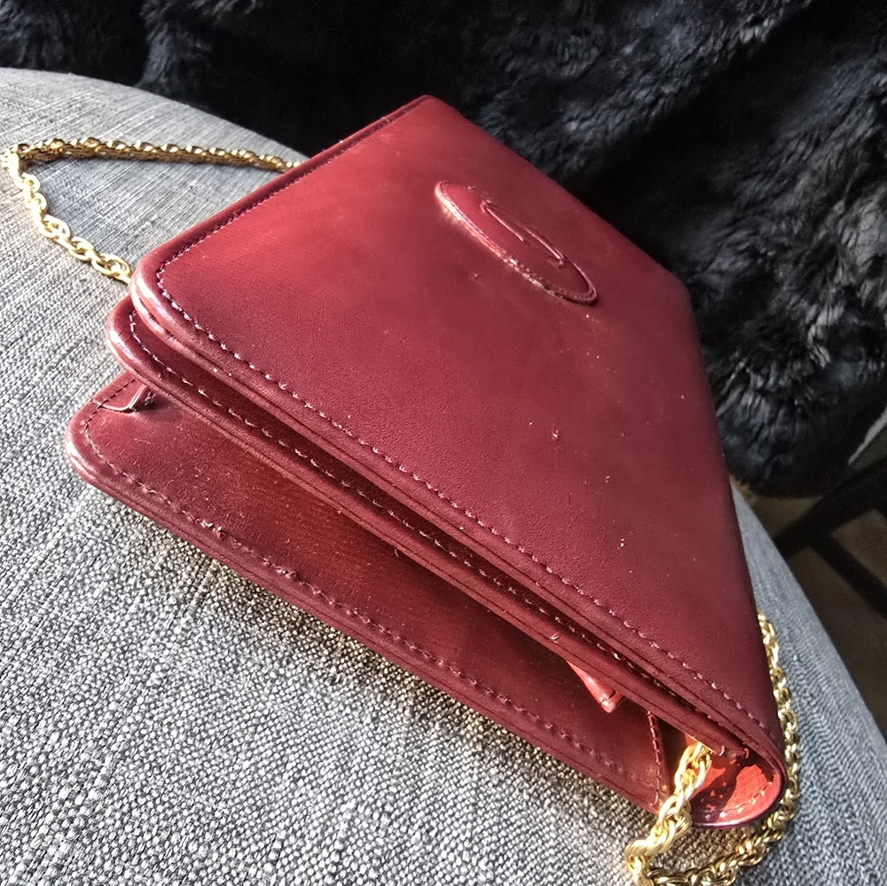 Elegant Cartier Burgundy Leather Shoulder Bag Or Clutch with Gold Chain